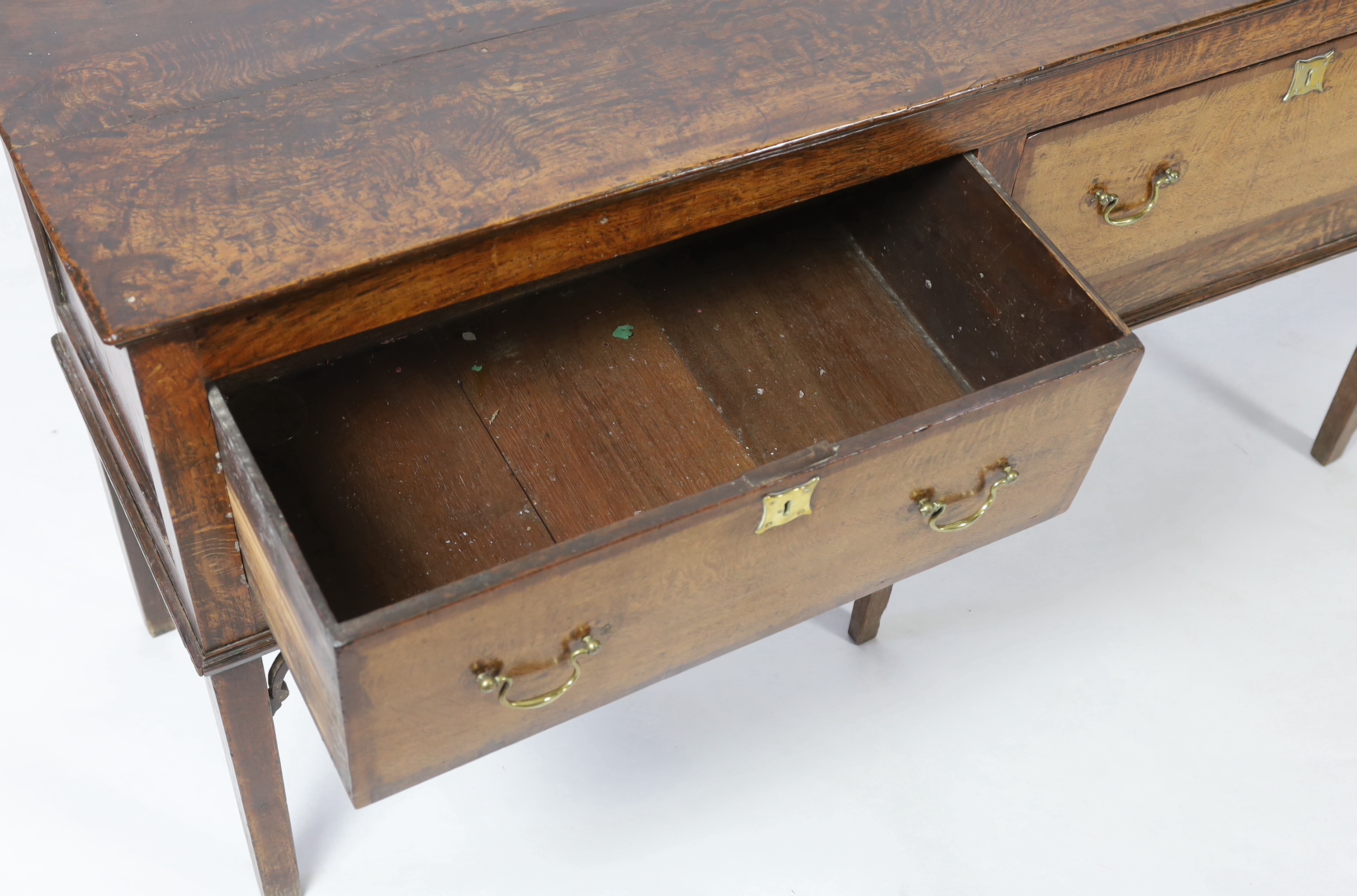 A mid 18th century oak dresser base